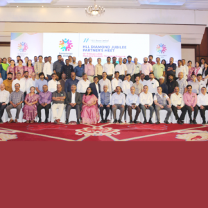 Around 100 HLL partners from across the country, with Dr. Anitha Thampi, Chairperson & Managing Director, HLL, Ajit N., Director (Marketing), and Ramesh P., Director (Finance), at the Diamond Jubilee Partners Meet, ‘Samanvaya 2026’.